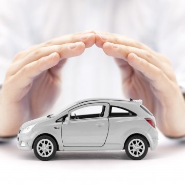 car insurance root insurance hands over toy car